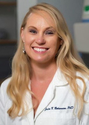 A headshot of Dr. Julia Bohannon wearing a lab coat.