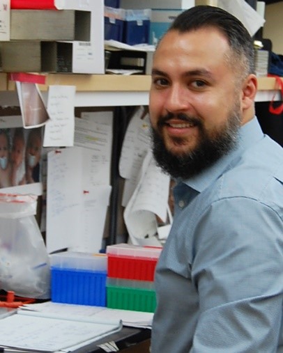 Dr. Romo in a lab.