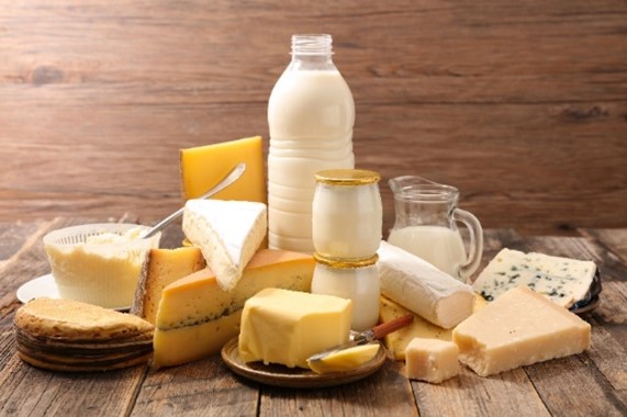 An assortment of milks and cheeses.