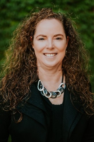 A headshot of Dr. Emily Scott.